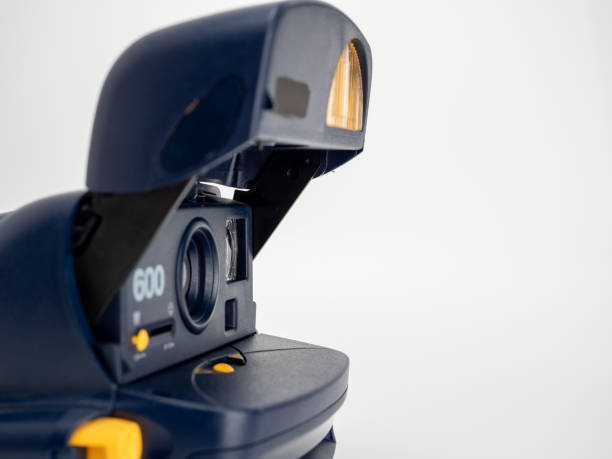 istock Vintage instant camera with selective focus, instant camera isolated on white background. 1466088716