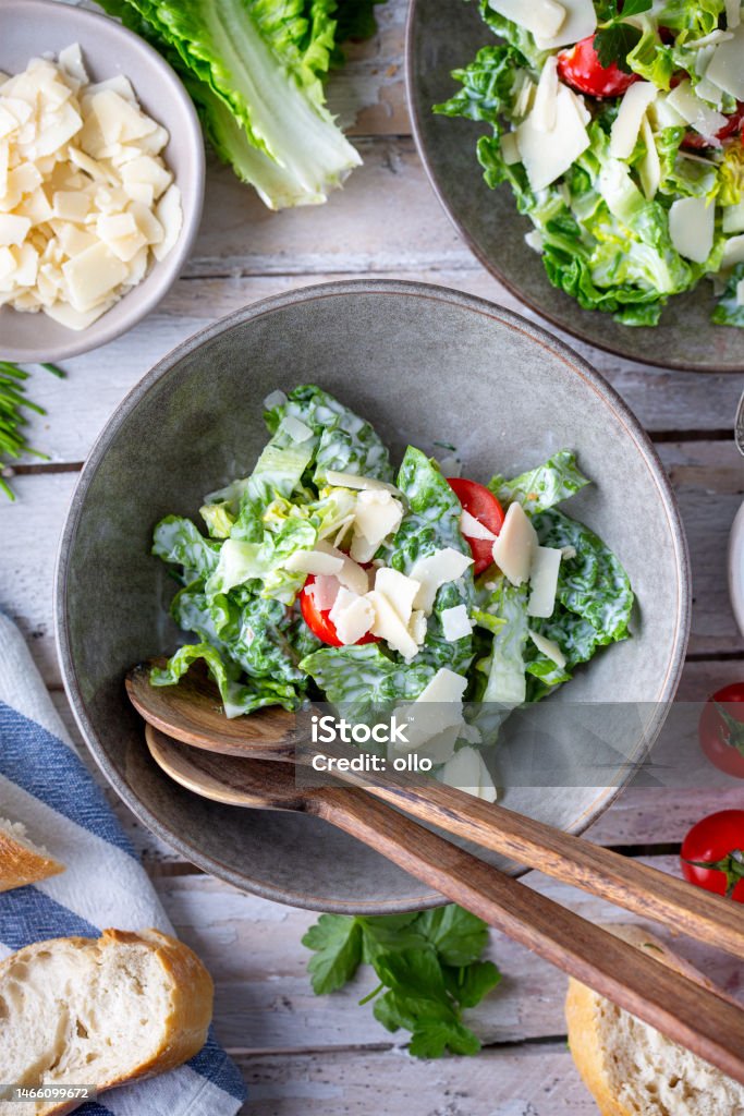 Green salad with tomatoes, bread and parmesan cheese Cheese Stock Photo