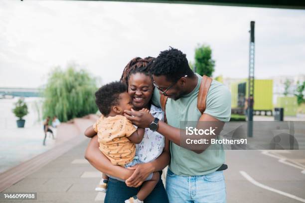 Happy African Family Having Fun Together Outdoors Stock Photo - Download Image Now - Family, Happiness, Vacations