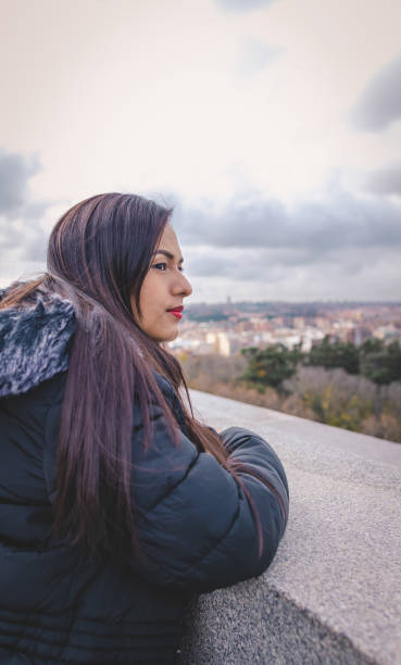 istock woman at a viewpoint in madrid 1466103234