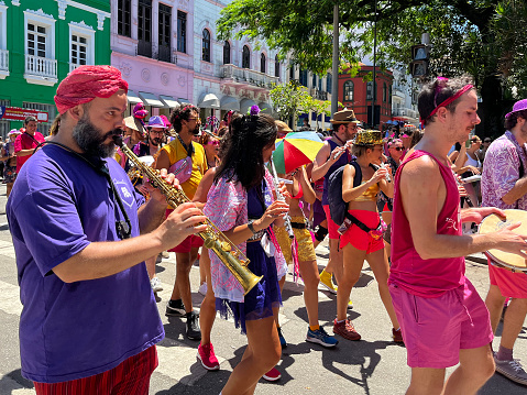 Florianópolis, Brazil - February 11, 2023: The musicians playing at the street carnaval right downtown in Florianópolis, Santa Catarina state - Brazil