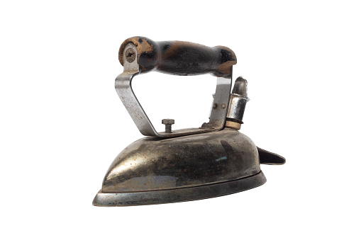 A dirty old iron isolated on a white background