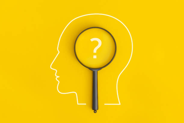 istock Human heads with a question mark on yellow background 1466110158