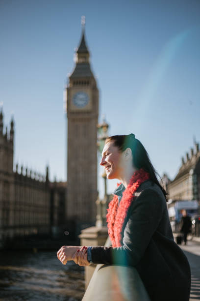 istock Woman having fun on Westminster Bridge 1466115400
