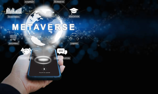 istock Metaverse on a smartphone. A hand holding a phone activates Metaverse on the virtual screen. The use of augmented reality technology. The Internet as a single, universal, and immersive virtual world. 1466124527