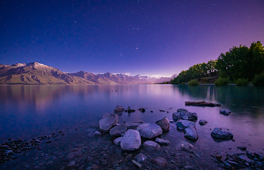 Beautiful night at Lake Pukaki looking at Southern Alps with the view of Mt Cook in backdrop, South Island, New Zealand.