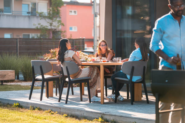istock Multiracial Girlfriends Sitting And Talking On A Summer Social Gathering 1466142387