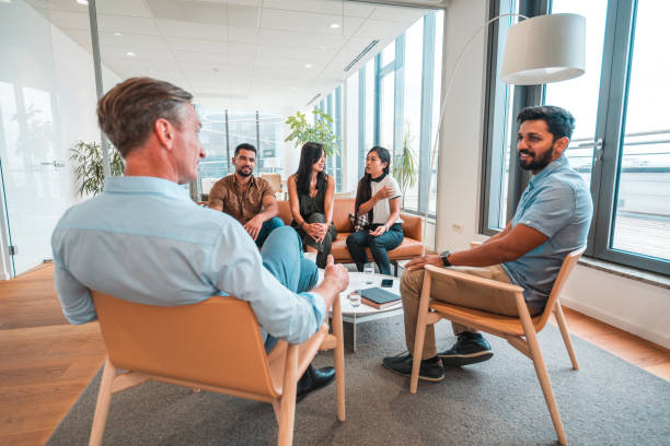 istock Mixed Race Office Colleagues Working In A Tourism Agency 1466142739