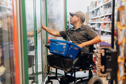 Man in wheelchair at grocery store