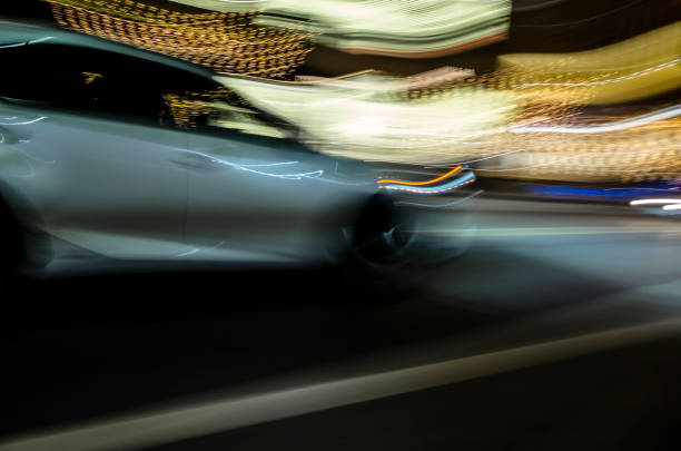 istock CAR AT NIGHT IN MOTION BLUR 1466147678