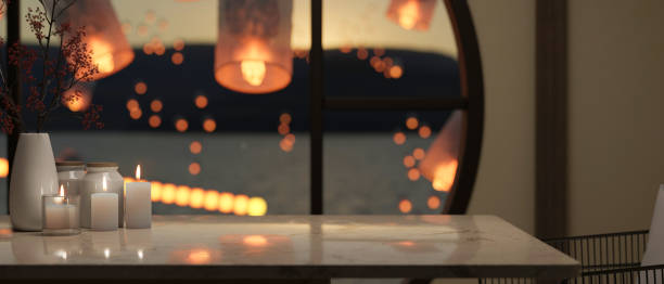 istock Table with copy space over blurred background of window with beautiful lanterns in the sky 1466174370