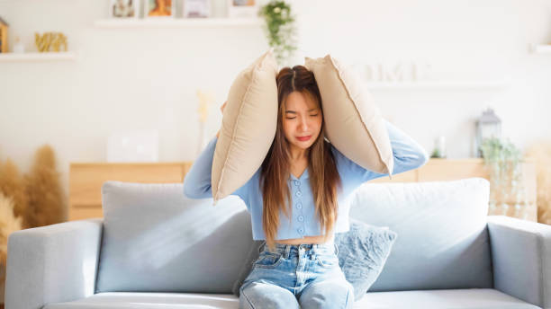 Young asian woman upset , sadness and frustrated by problem with work or relationships. Feeling despair and anxiety, loneliness, having psychological trouble stock photo