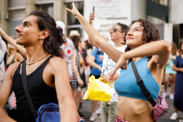 istock People celebrating carnival on the street 1466178368