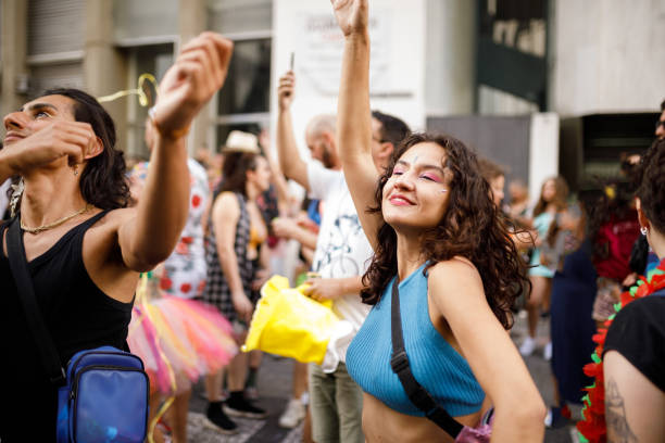 istock People celebrating carnival on the street 1466178463