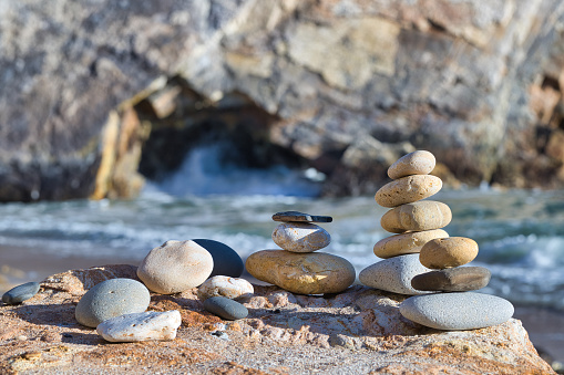 Stacked Stones on a Rocky Beach