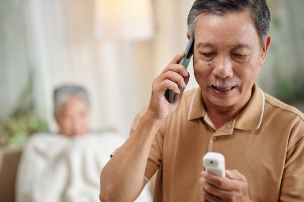 istock Senior Man Calling Doctor 1466196784