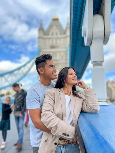 istock Diverse couple on the Tower bridge in London 1466198471