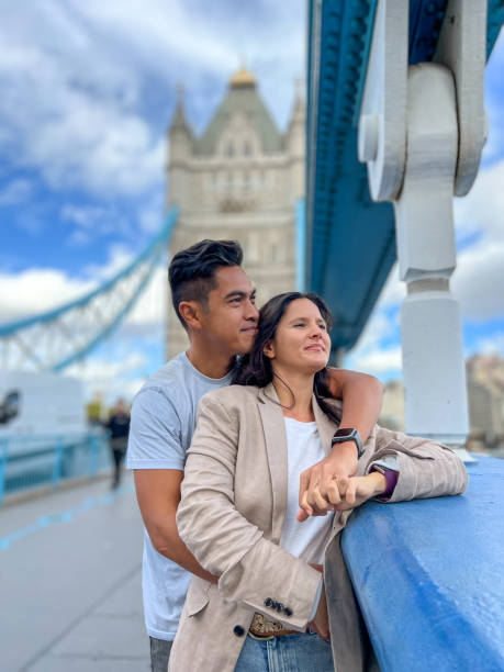 istock Diverse couple on the Tower bridge in London 1466198530