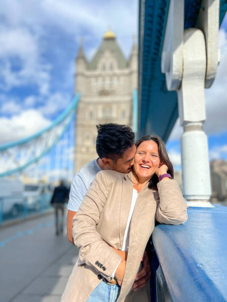 istock Diverse couple on the Tower bridge in London 1466198556