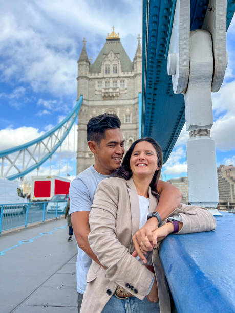 istock Diverse couple on the Tower bridge in London 1466199038