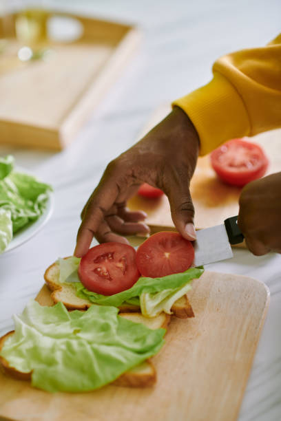 istock Woman Making Sandwich 1466206778