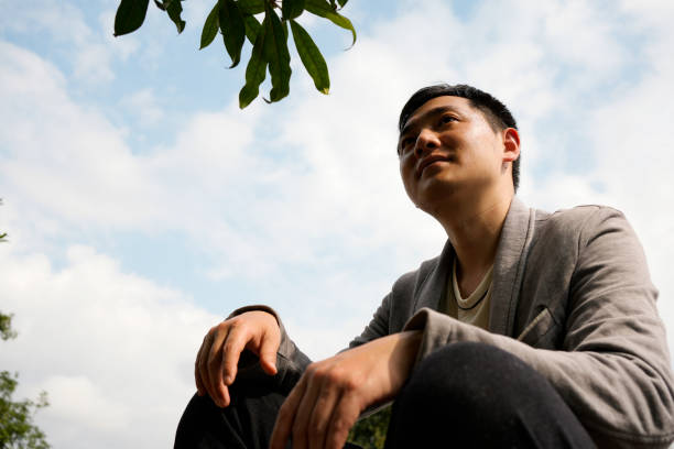 istock The man is enjoying the sunshine on his face 1466210256