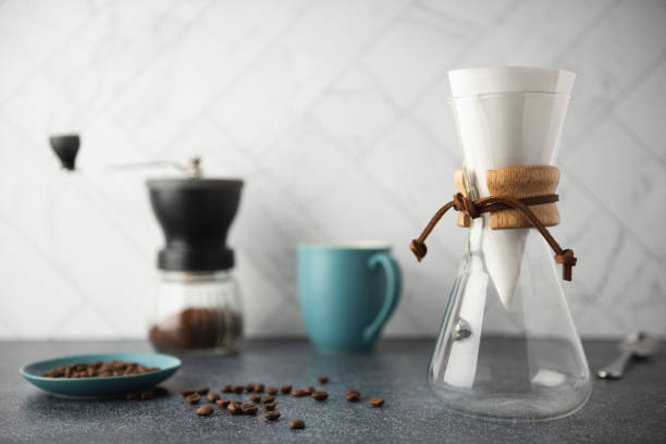 istock Preparing Pour-over coffee on a bright clean kitchen counter 1466214498