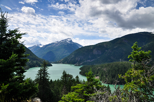 Lake with beautiful colors surrounded by mountains. Taken in North Cascades National Park.