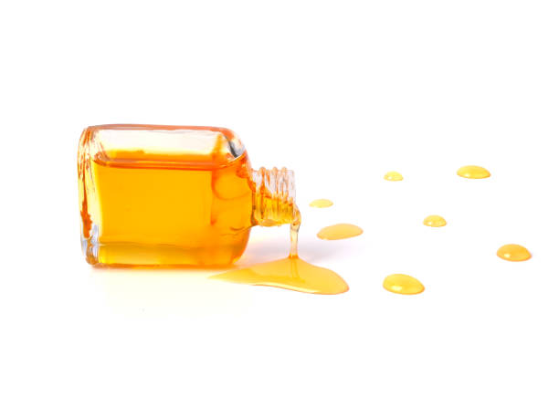 istock Bottle of honney isolated on white background. 1466243430