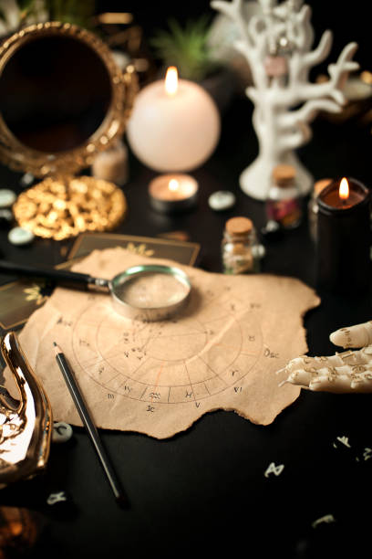 istock Blurred Fortune teller woman reading a future by tarot cards 1466246643