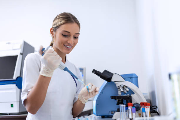 istock Modern Medical Research Laboratory: Female Scientist Working with Micro Pipette, Analysing Biochemicals Samples. Advanced Scientific Lab for Medicine, Microbiology Development. 1466258644