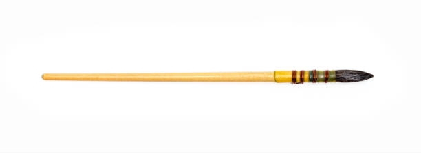 istock Watercolor paint brushes on white background. Pointed brushes. 1466264673
