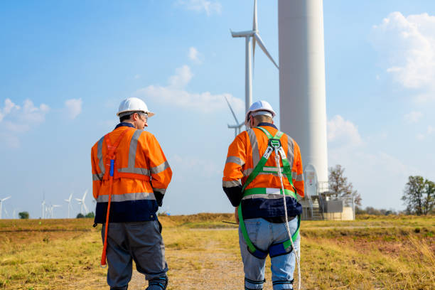 istock Renewable energy engineer working on wind turbine 1466269342