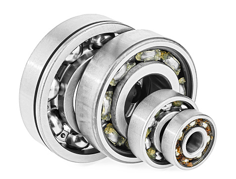 Group of metal bearings isolated on a white background. Steel ball bearings.