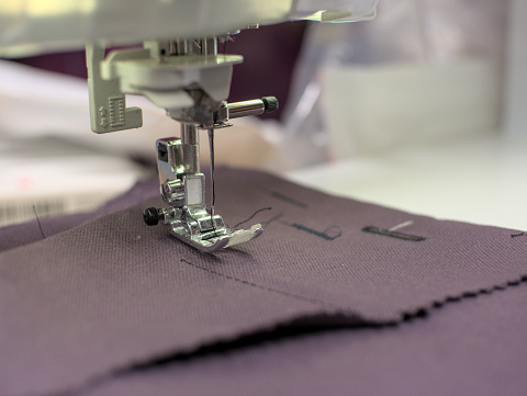 Close up of a sewing machine in a dressmaker workshop