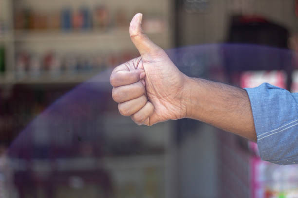 istock a man show his own hand style and the background is blurred 1466282055