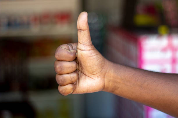istock a man show his own hand style and the background is blurred 1466282098