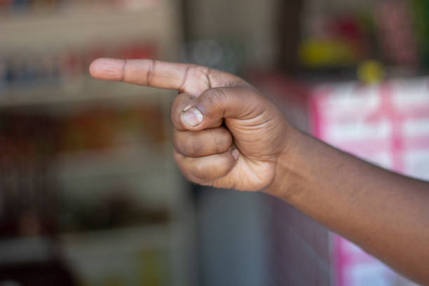 istock a man show his own hand style and the background is blurred 1466282552