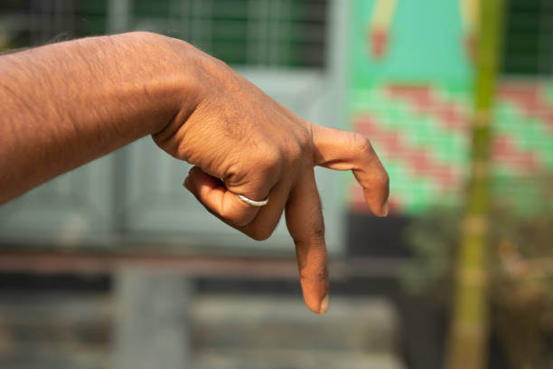 istock a man show his own hand style and the background is blurred 1466284481