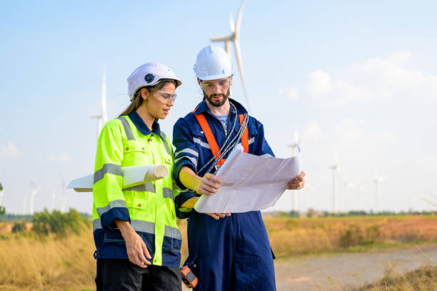 istock Renewable energy engineer working on wind turbine 1466286129