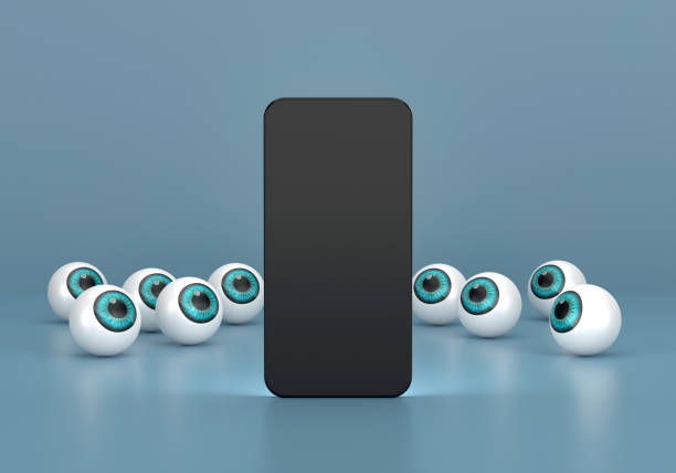 istock Abstract eyes is looking at the Mobile Phone 1466286410