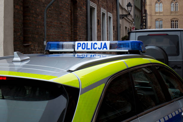 istock Police car on city streets 1466287628