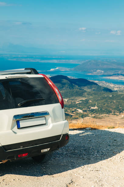 istock suv car travel concept Lefkada island Greece 1466291927