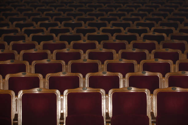 istock Row of red seats in theatre 1466292492