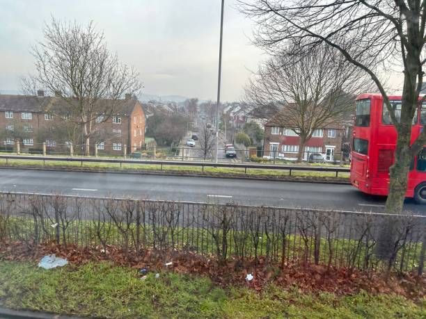 istock Motorway with residential houses both sides. 1466298705