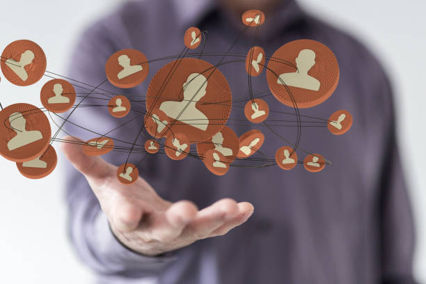 istock Neural network concept with connections between people above a hand 1466302345
