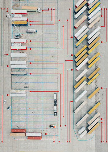 Drone view of a distribution warehouse  with arrows