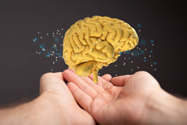 Shot of an artificial brain testing concept with additional effects over human hands
