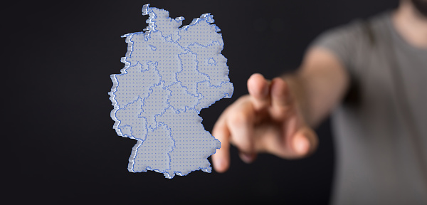 A germany map digital in hand 3d