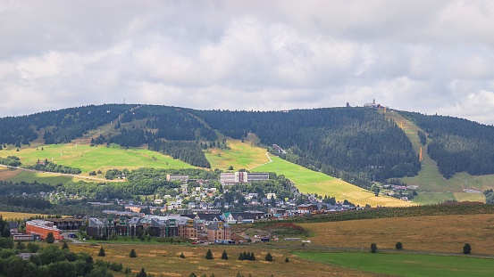 A view to the Kurort Oberwiesenthal city and mountain Fichtelberg